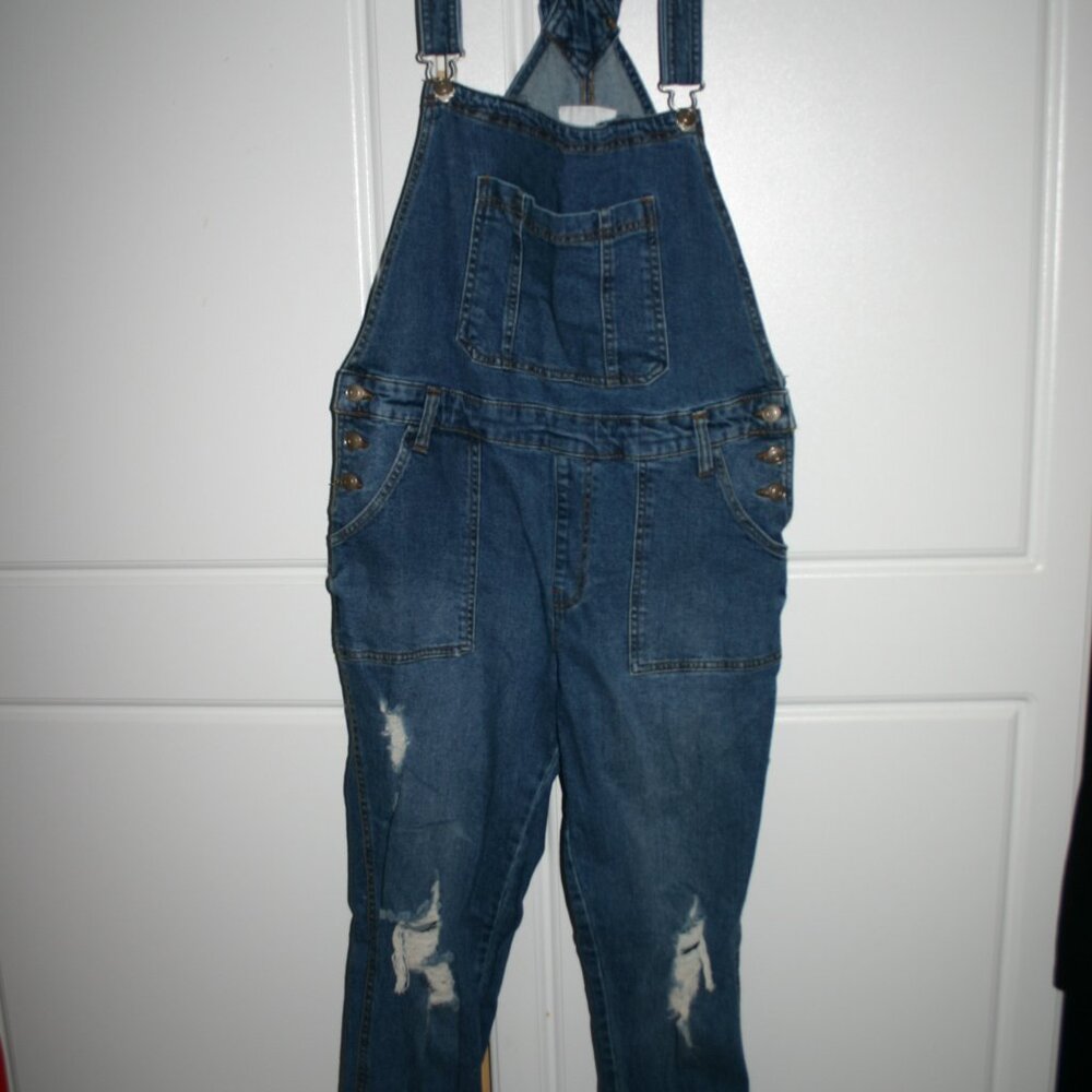 Distressed denim overalls
